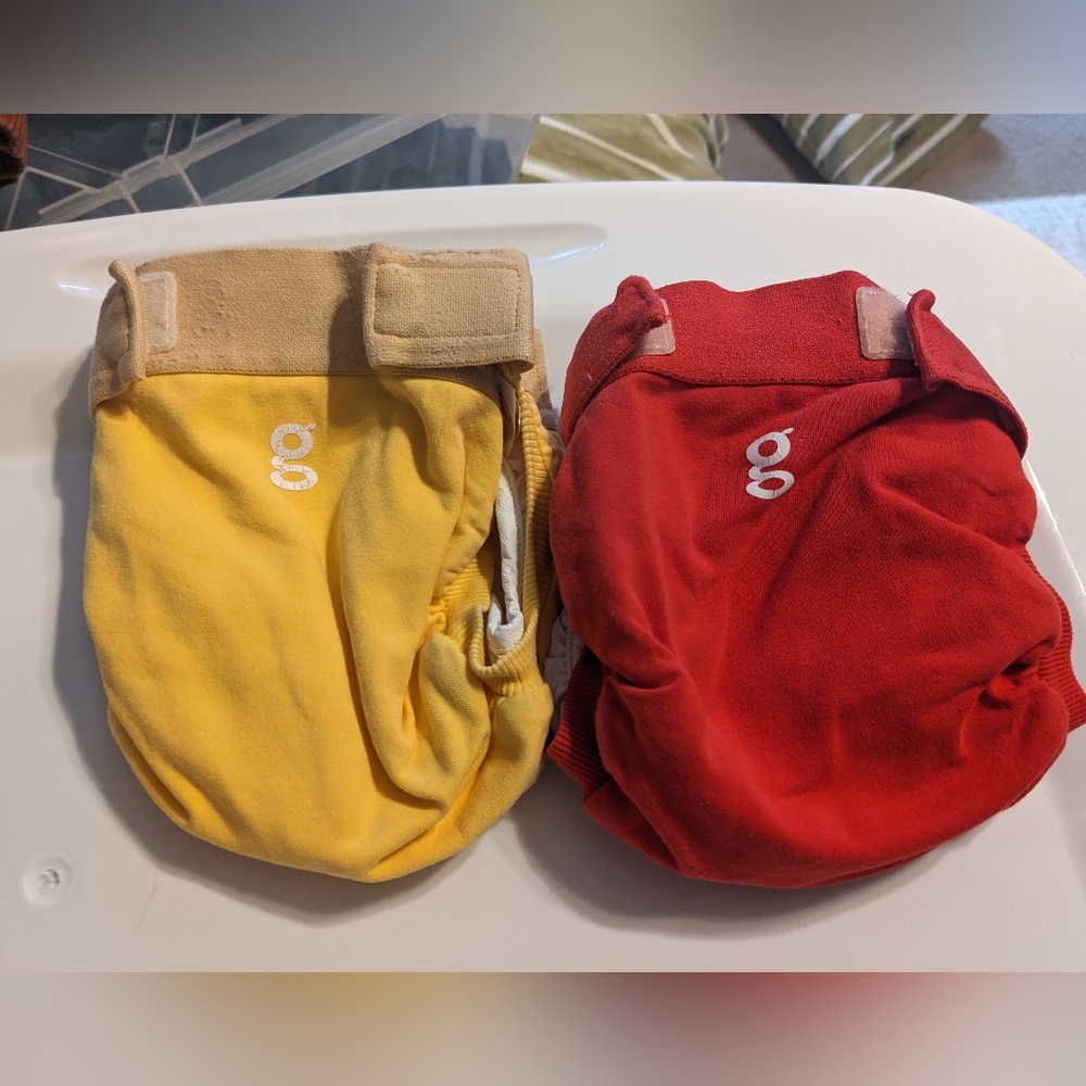 TWO g diapers size medium